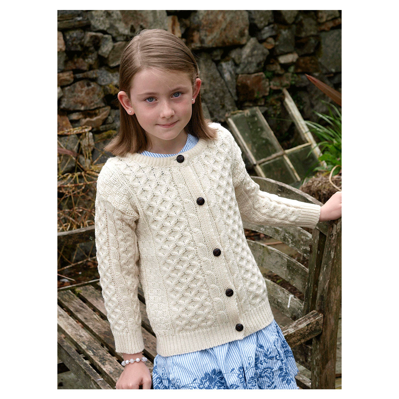 cream color Irish cardigan for children