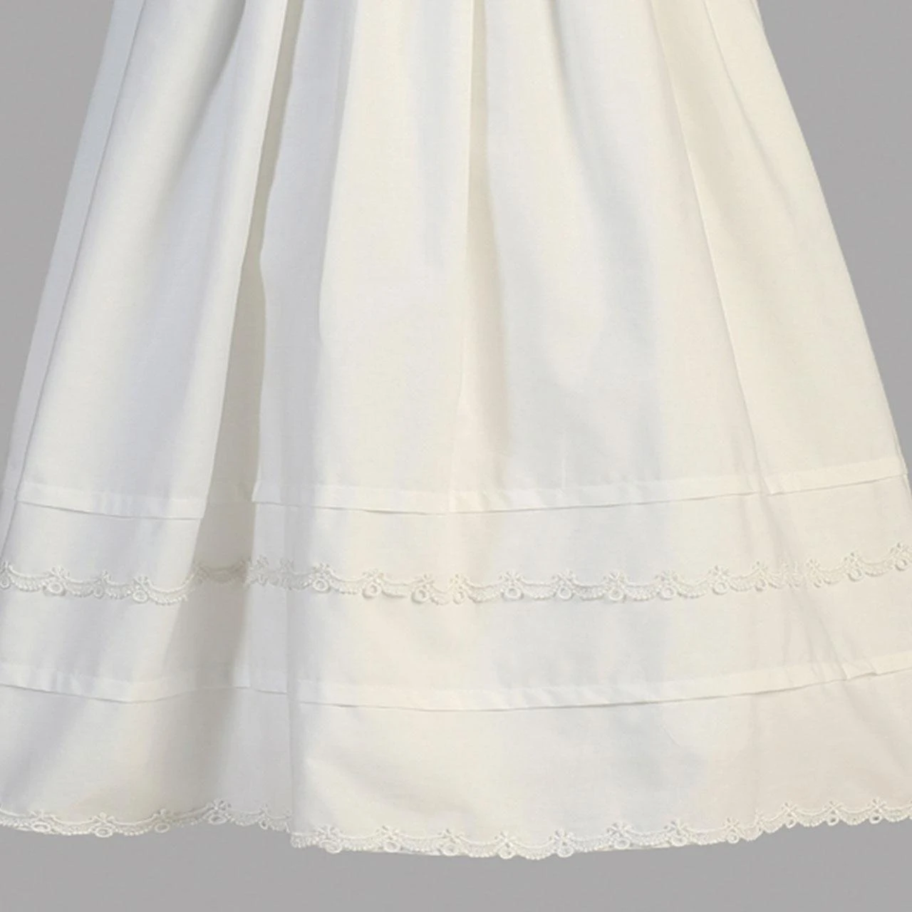 Detail of Embellished lower hem of Marie Cotton Christening Gown