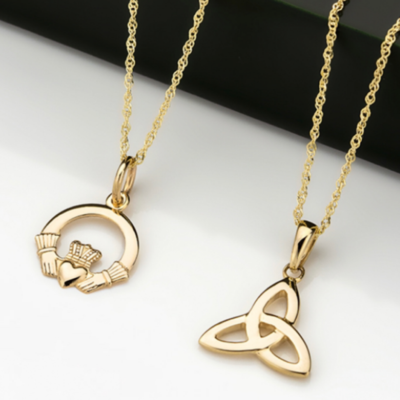 Éireloom 10K Trinity Knot Pendant on 18" 10K gold chain show with our Claddagh Pendant N22607