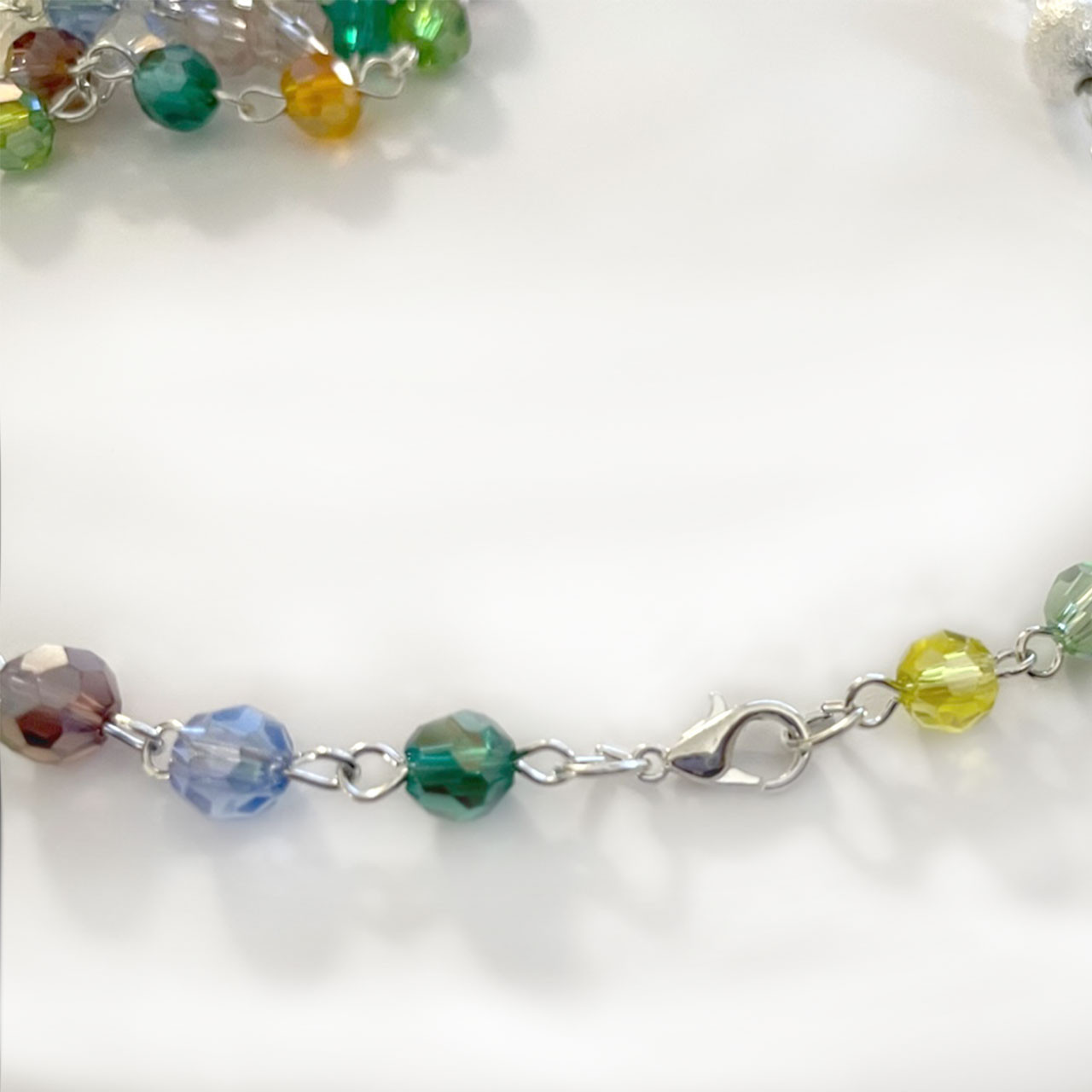 detail photo of the clasp of the Crystal Rosary Necklace