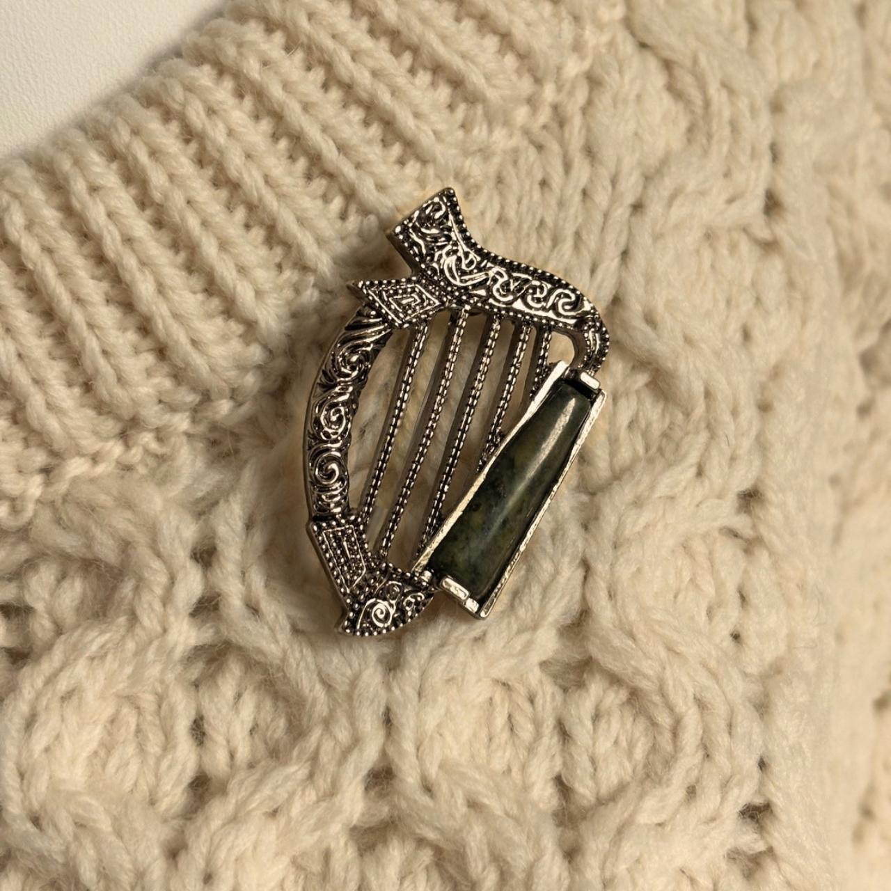 Irish Harp Brooch with Connemara Marble shown on sweater
