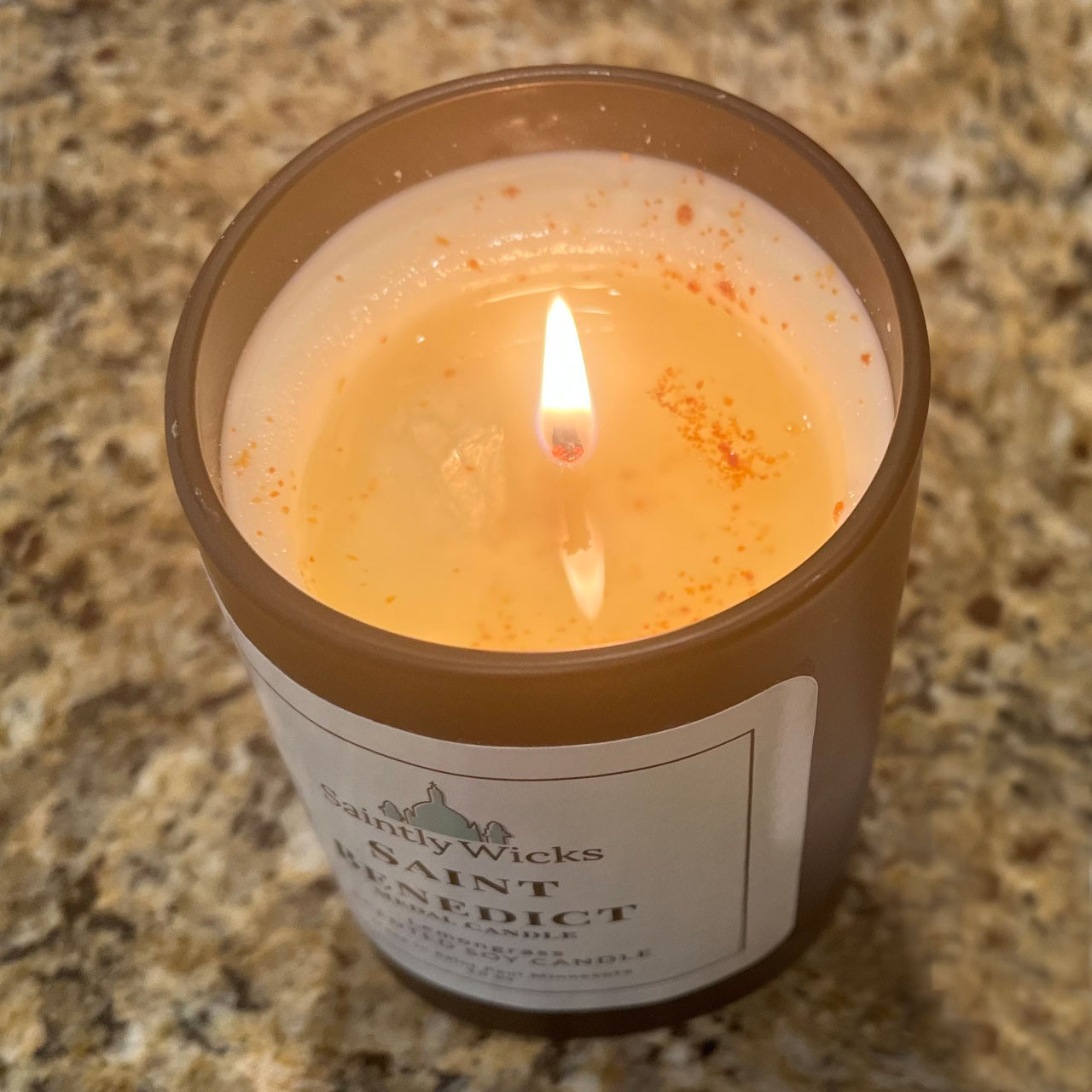 Saint Benedict Soy Candle with Medal burning