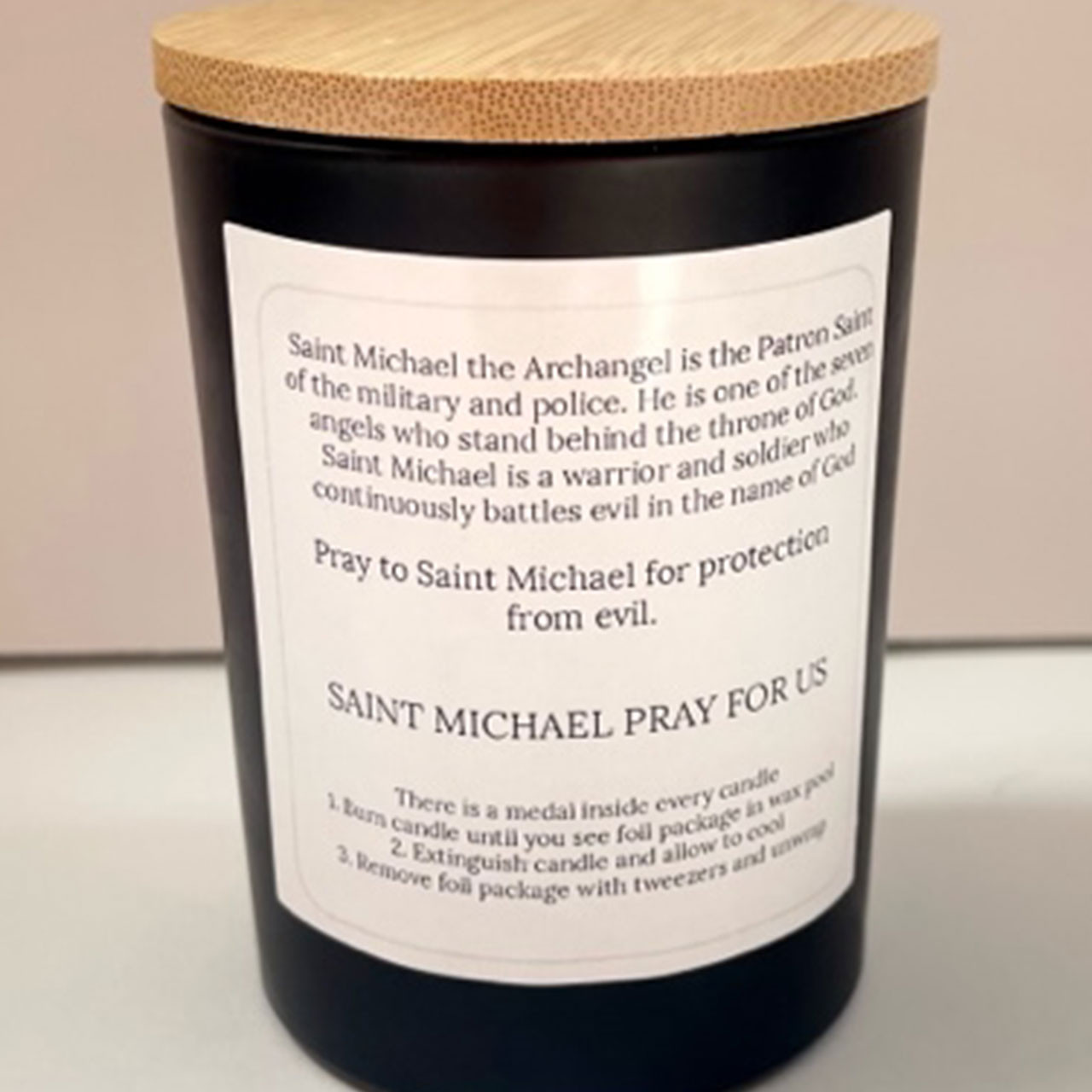 Back label of the Soy Saint Michael Candle with Medal