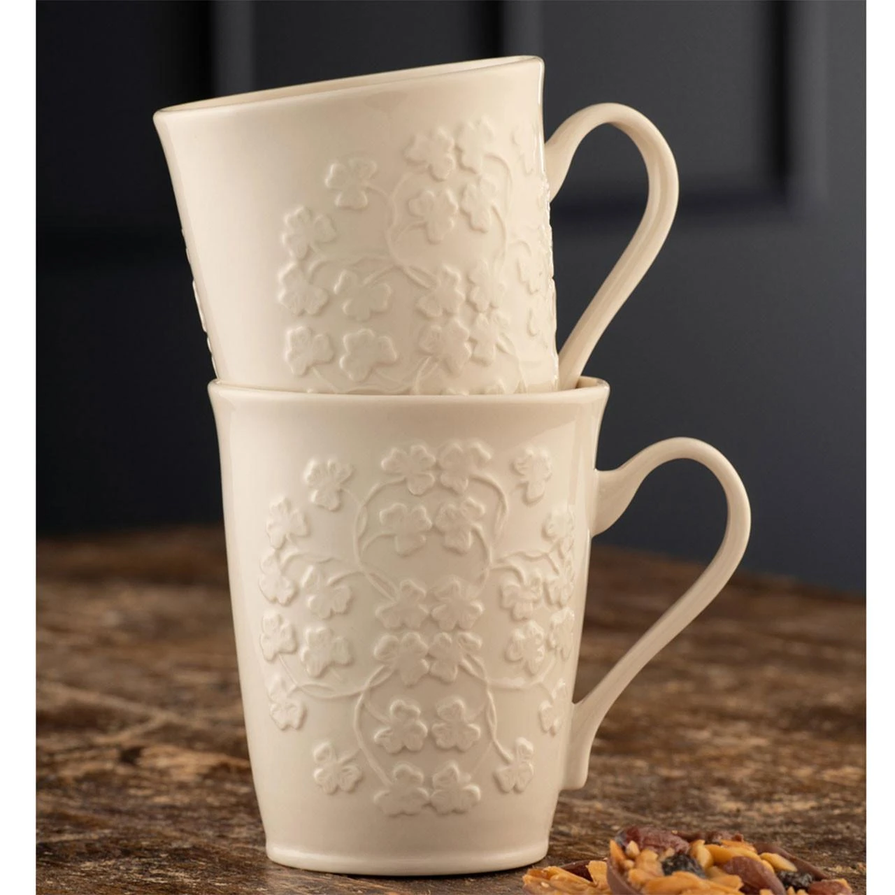 Belleek Set of 2 Field of Shamrock Mugs shown on a tabletop