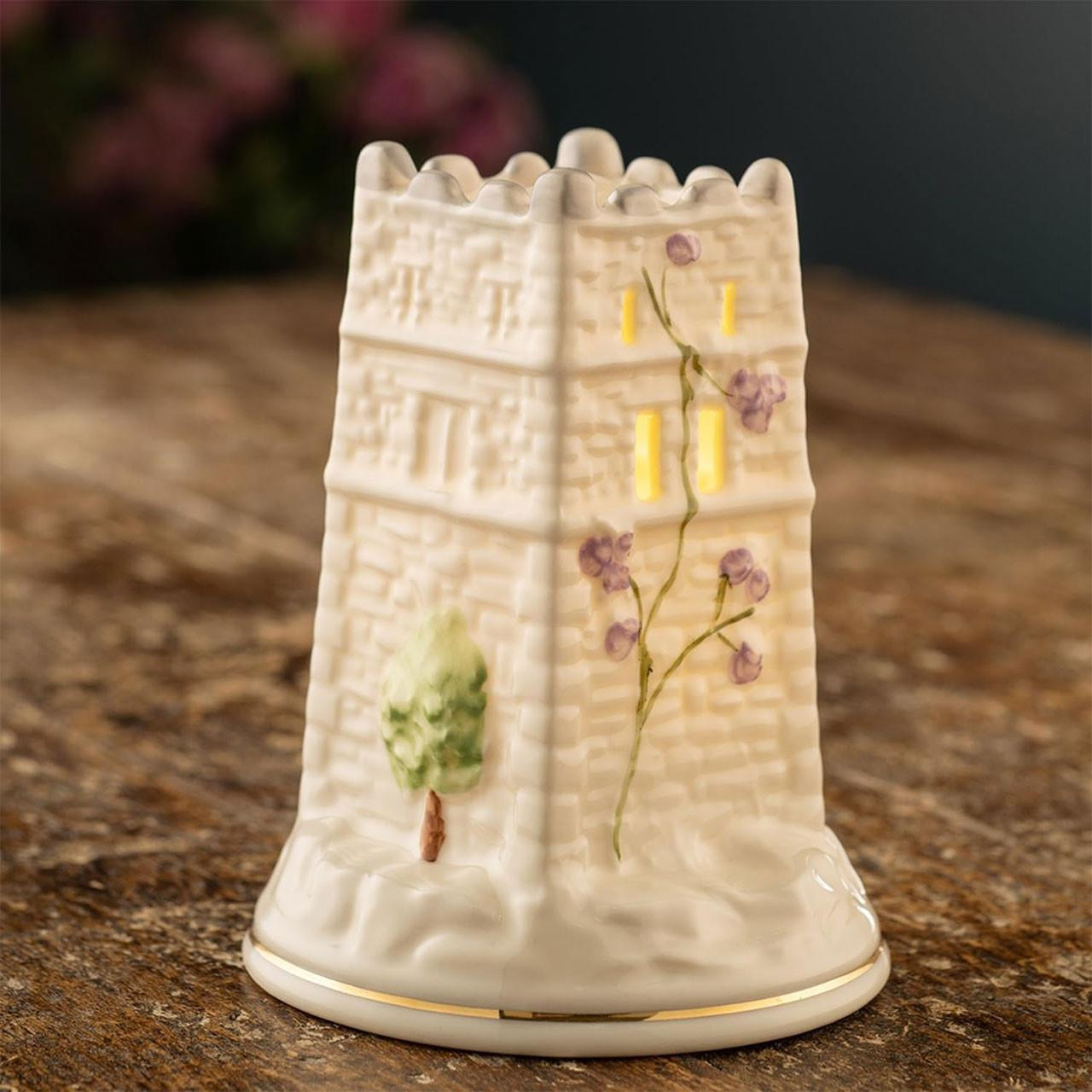 The back view of the Belleek LED Monea Castle Light on a table
