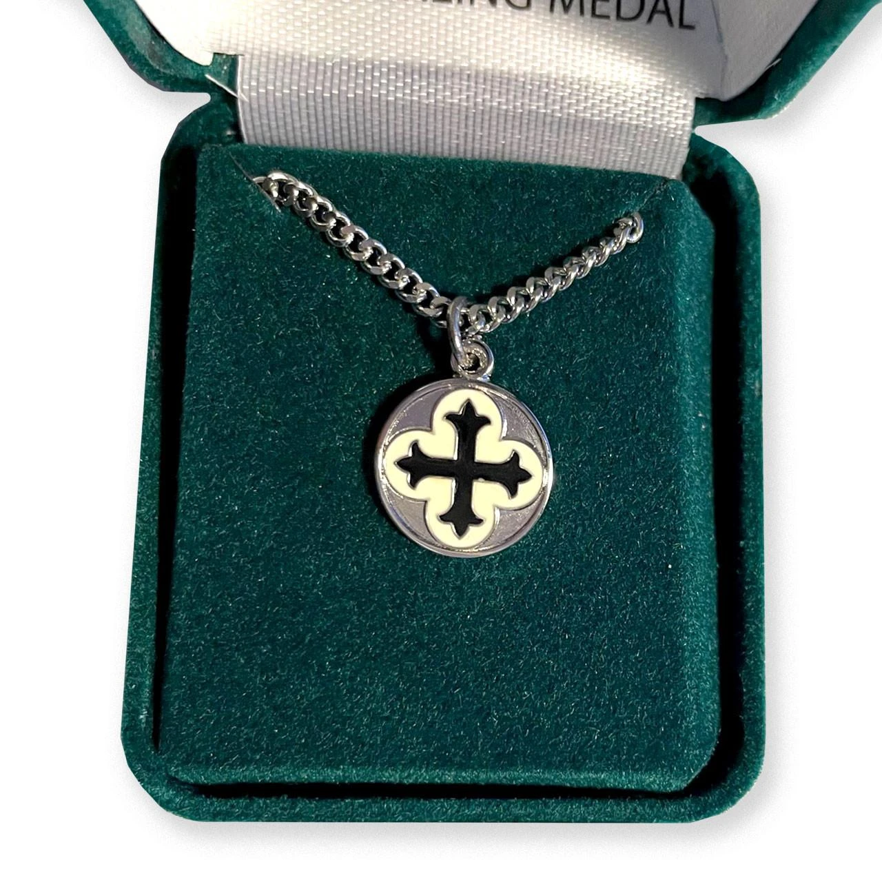Round Sterling Cross Pendant in jewelry box