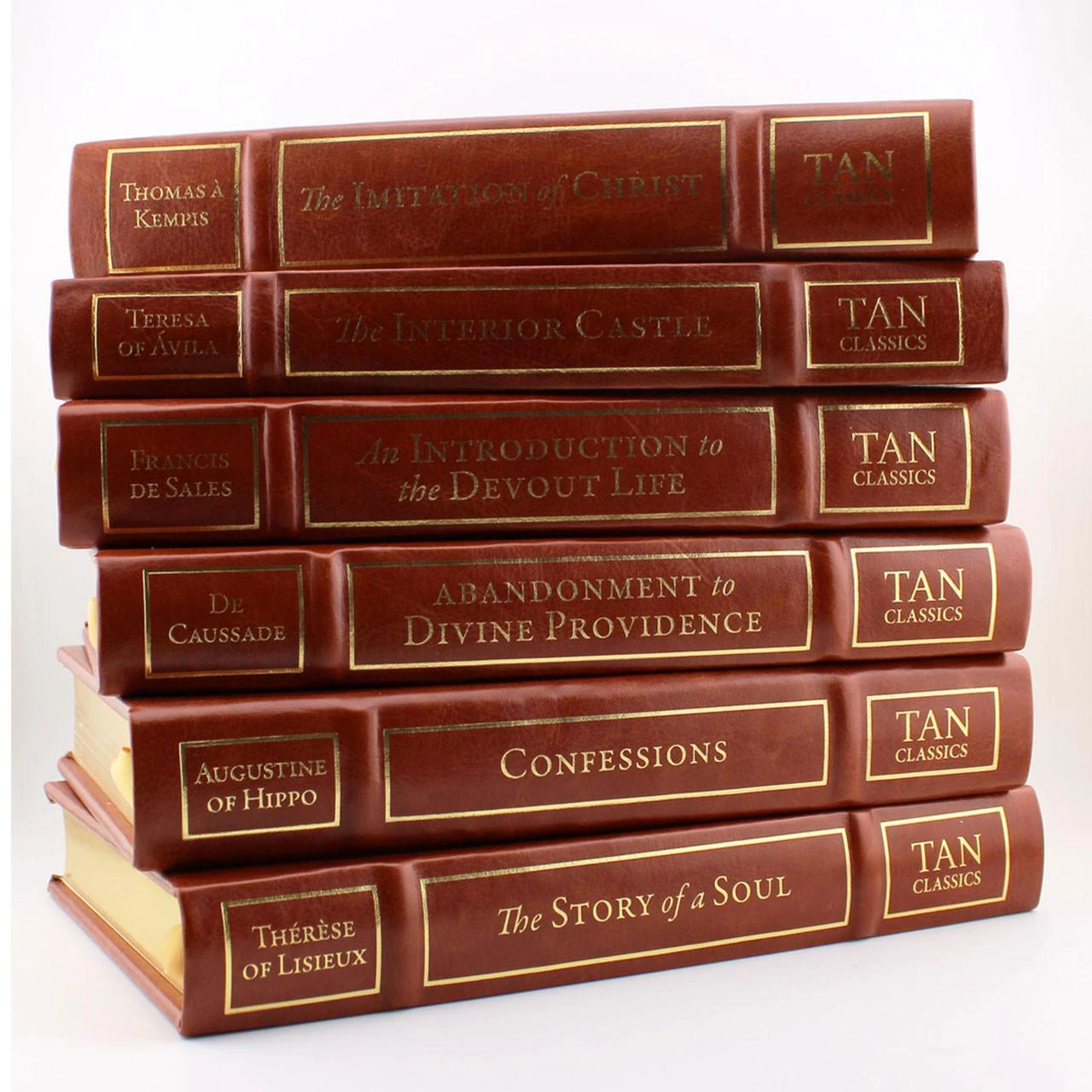 Spines of the Tan Catholic Classics Deluxe Edition Set