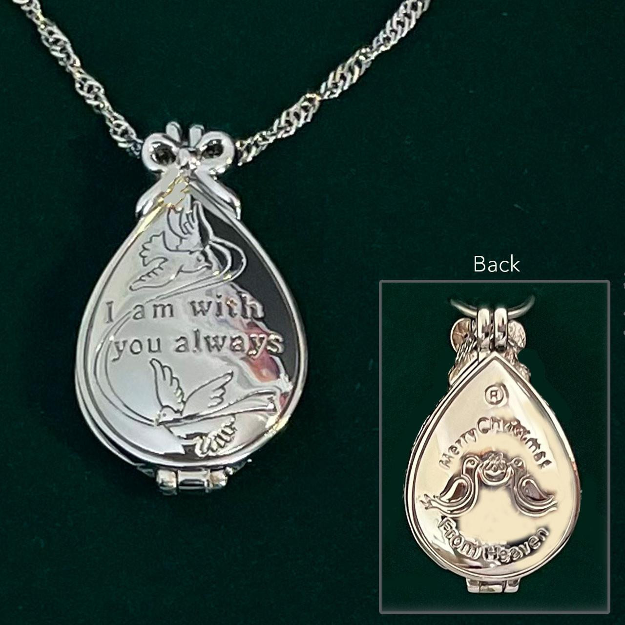 Detail of the Front and Back of the A Gift From Heaven Locket