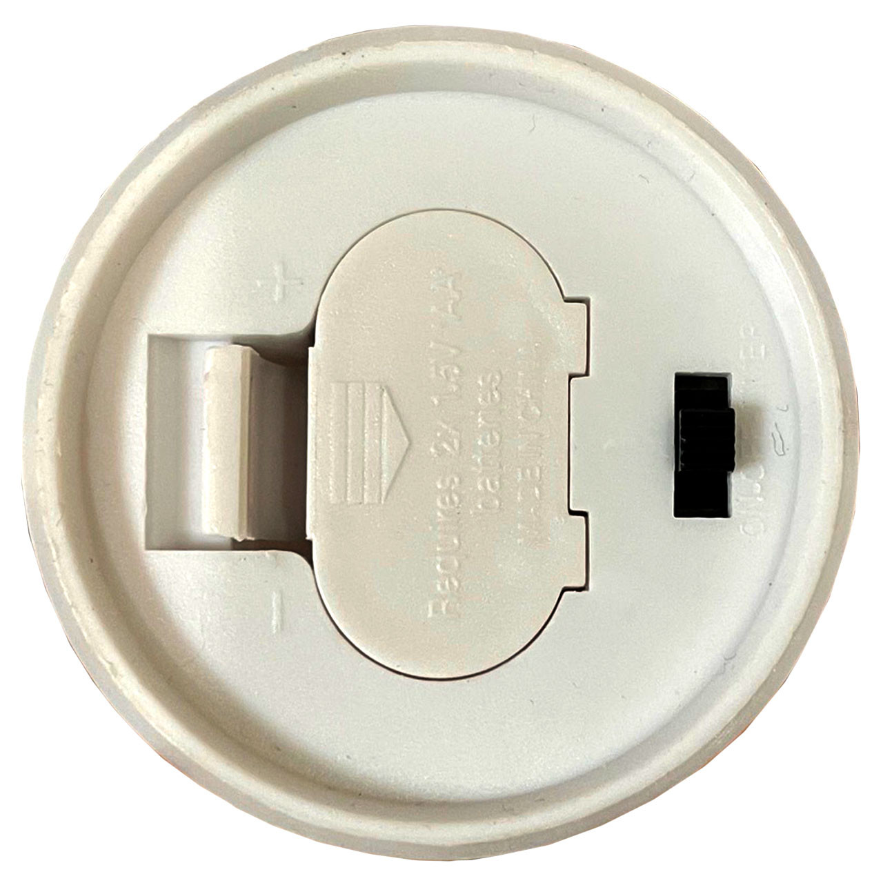 Battery door and the On/Off switch on the candle bottom