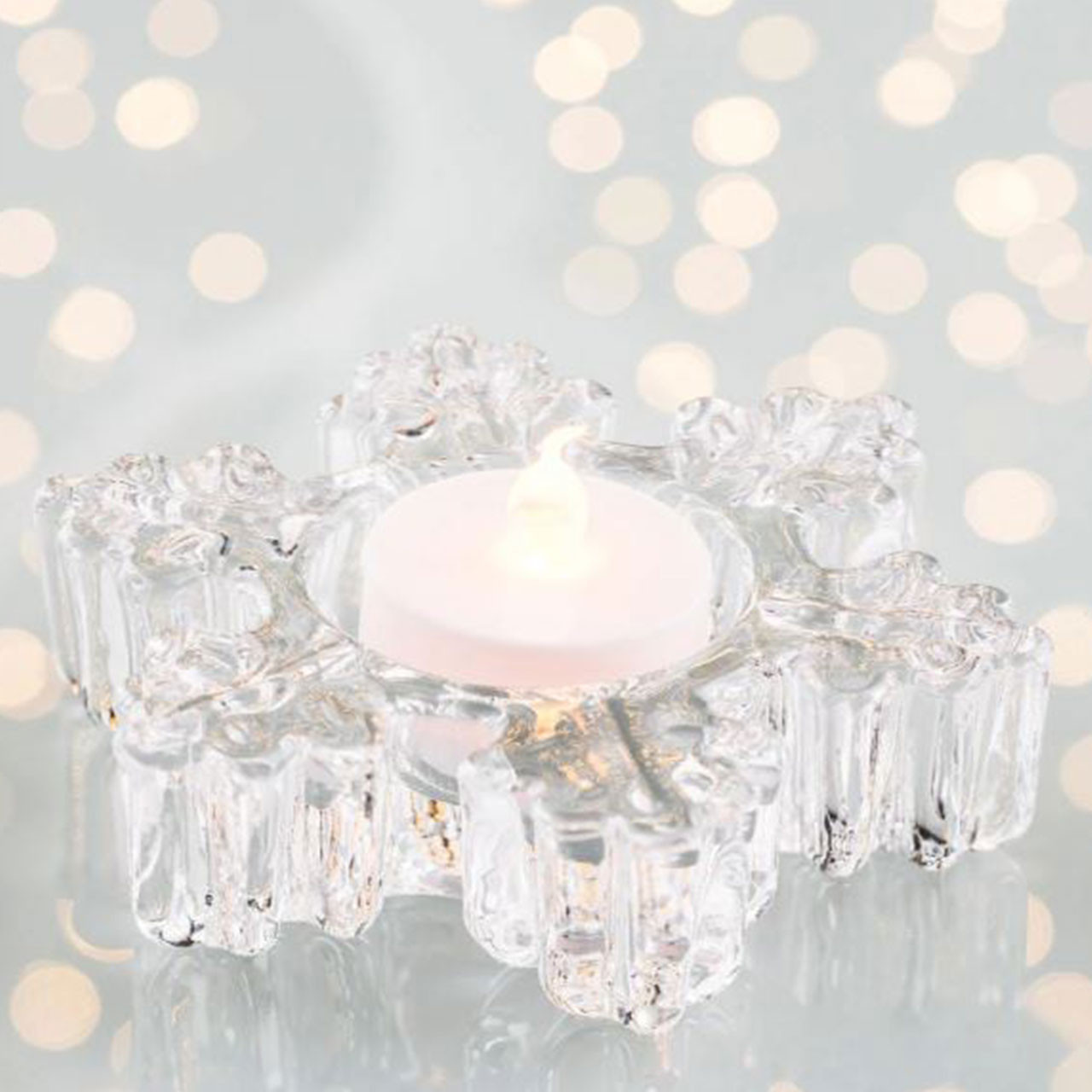 Detail of the Galway Crystal Snowflake votive holder with included LED votive candle