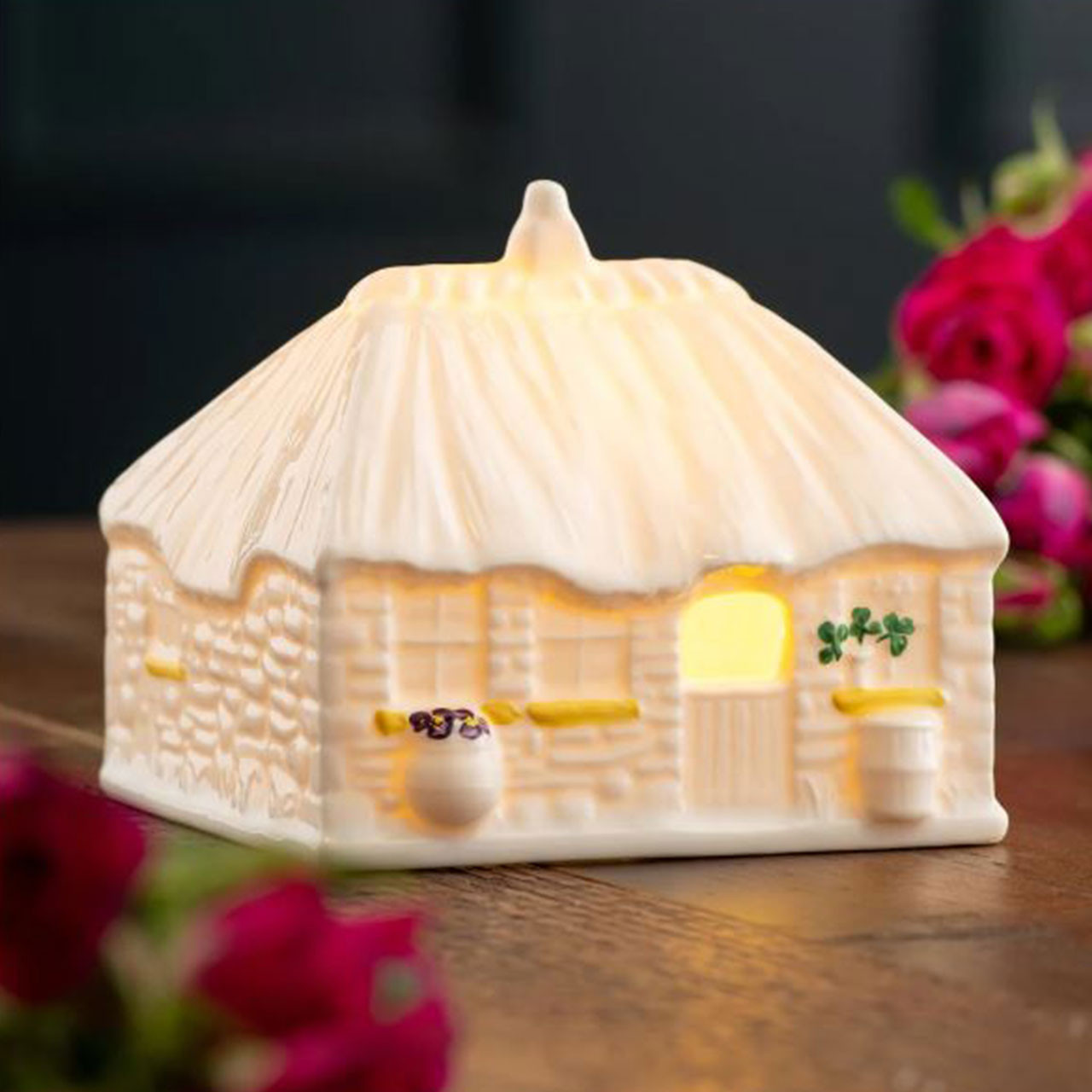 Front of the 2025 LED Belleek Irish Thatched Cottage in home setting