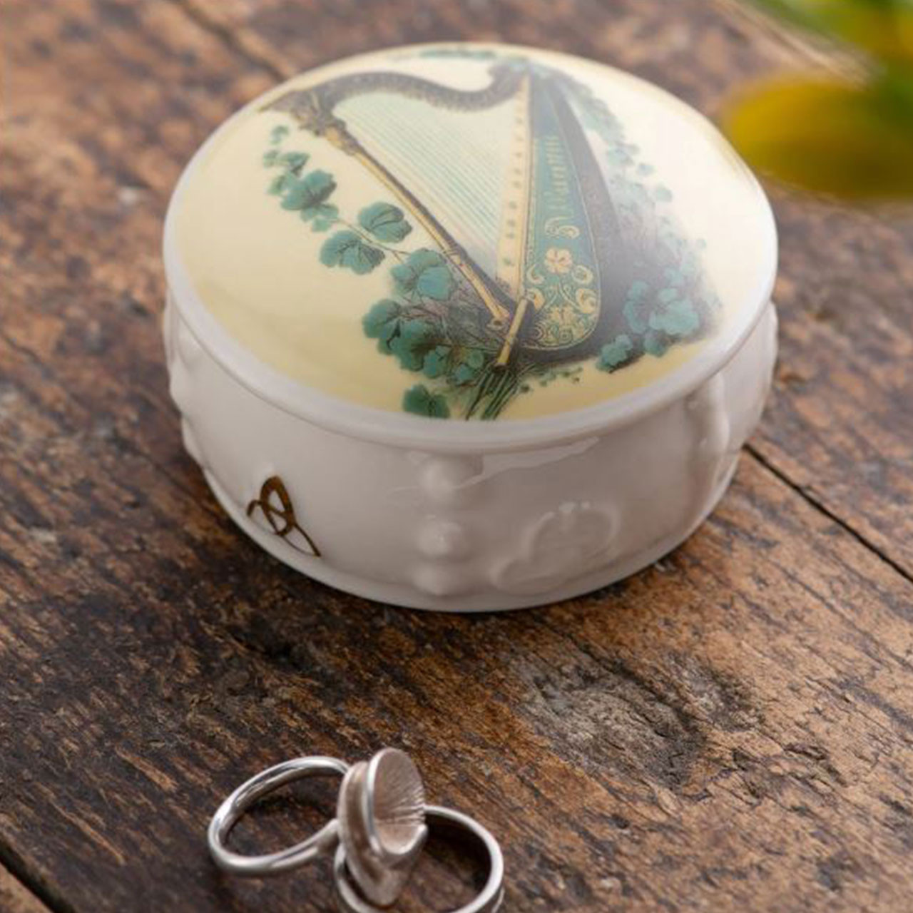 Belleek Classic Harp Trinket Box shown in a home setting