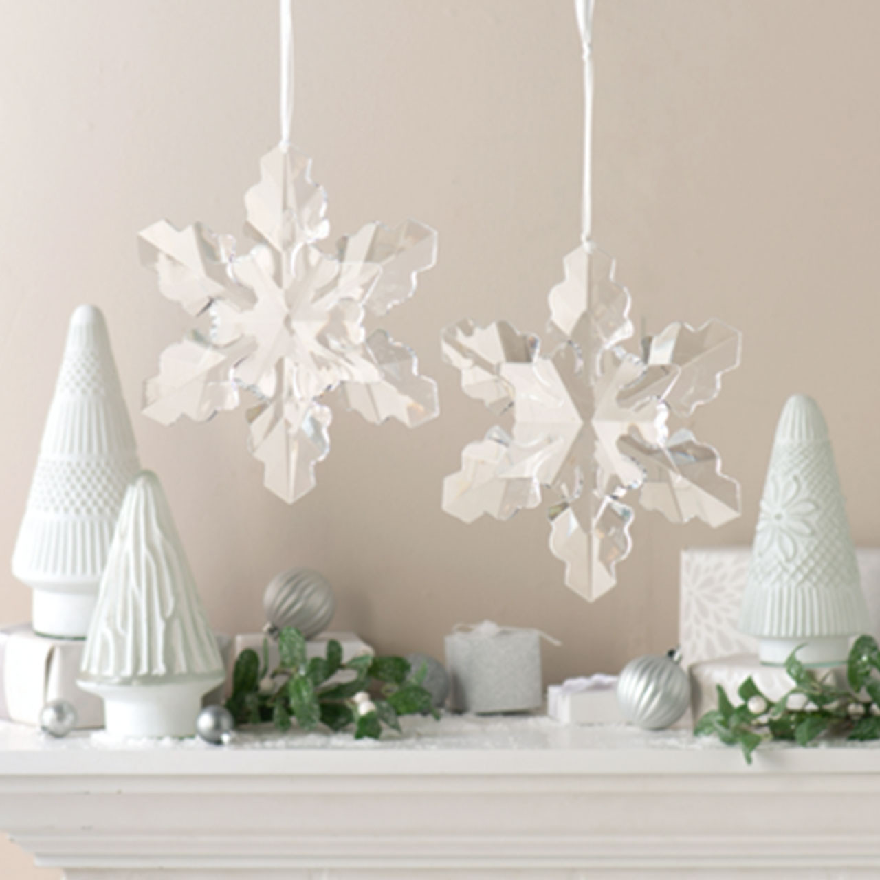 Large Snowflake Decoration shown in a display with a second snowflake. Note: this product is purchased as a single snowflake only Large Snowflake Decoration shown in a display with a second snowflake. Note: this product is purchased as a single snowflake only