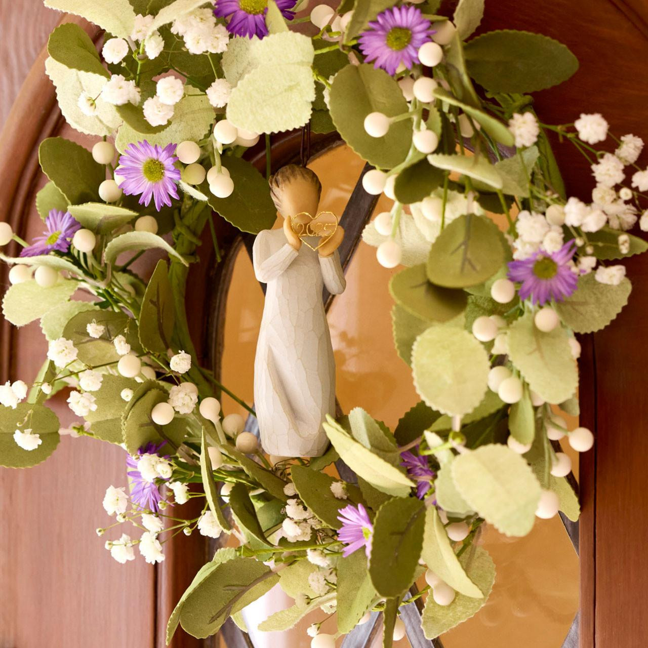 Willow Tree 2025 Ornament shown hanging in a door wreath