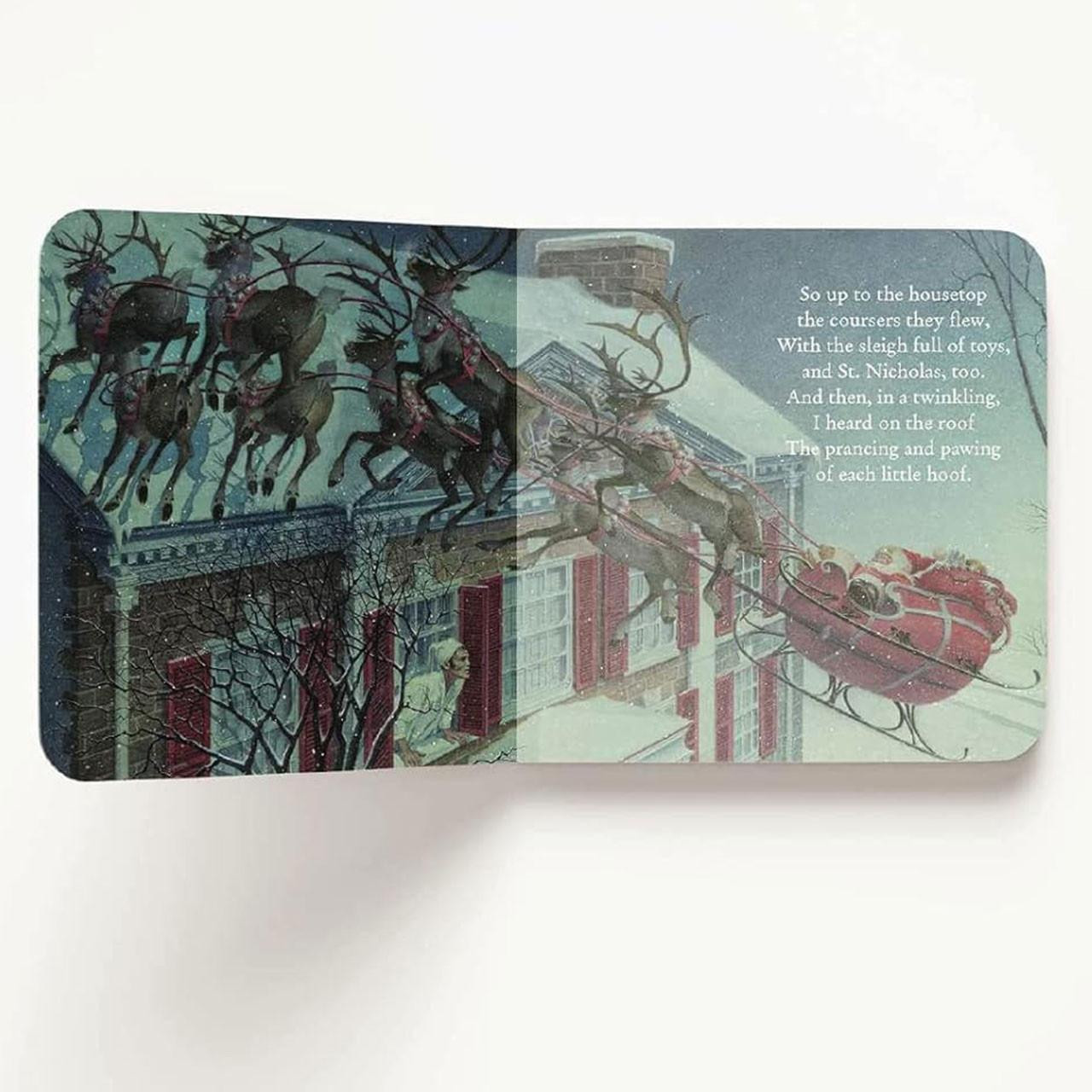 Dramatic portrayal of the sleigh in flight in the Board Book Night Before Christmas