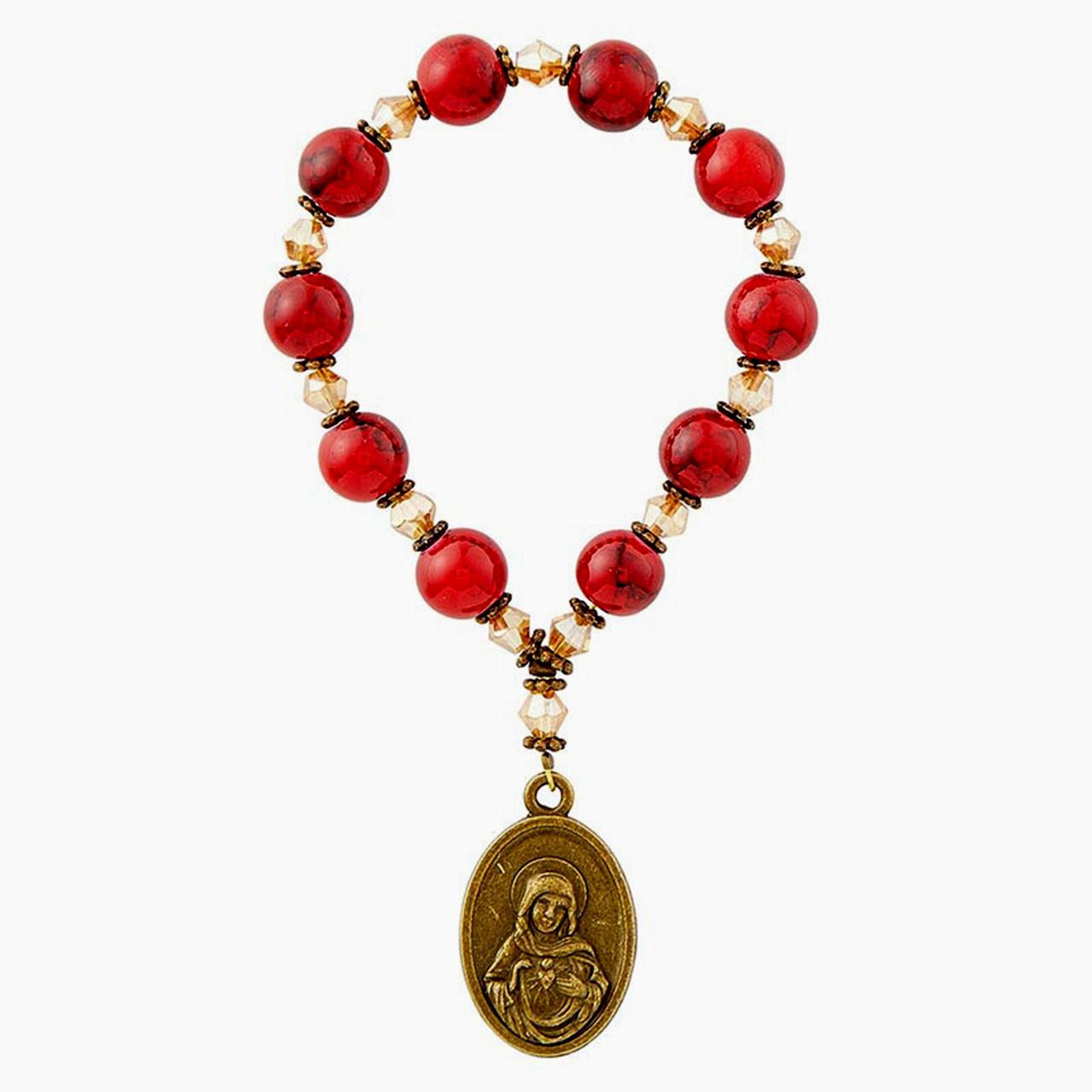 Detail of the other side of the medal with the Immaculate Heart of Mary