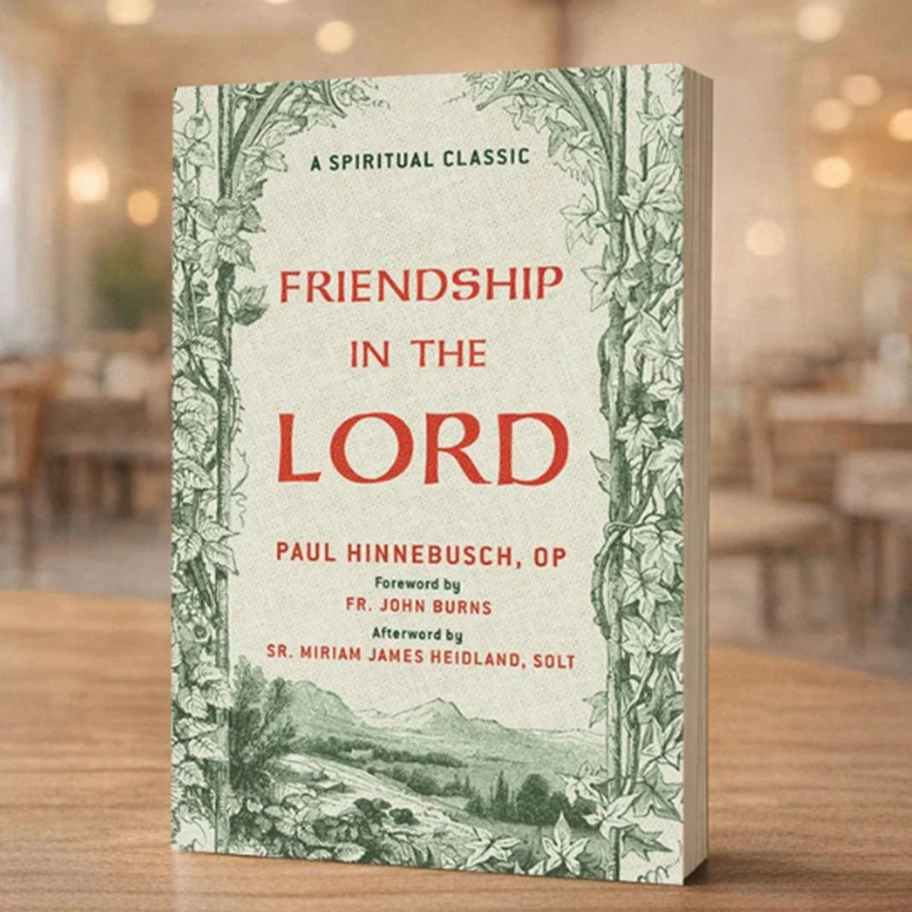 Friendship in the Lord front cover shown on table in dining room