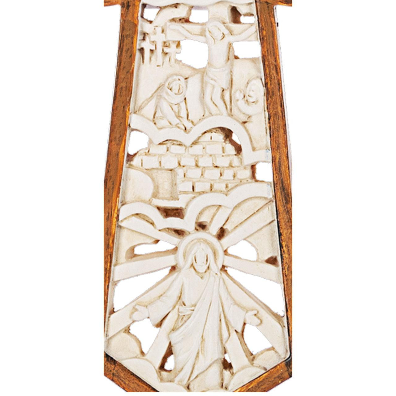 A detail of the Passion of Christ Cross Ornament showing the Crucifixion and Resurrection images.