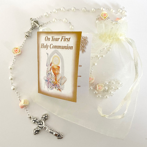 Detail of the Pearl and Rose Rosary, card, and organza bag