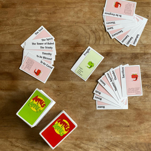 Components included n the Apples to Apples Bible Edition Game
