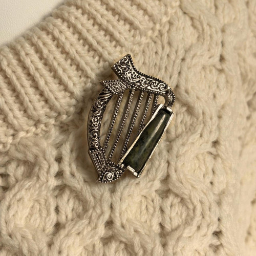 Irish Harp Brooch with Connemara Marble shown on sweater