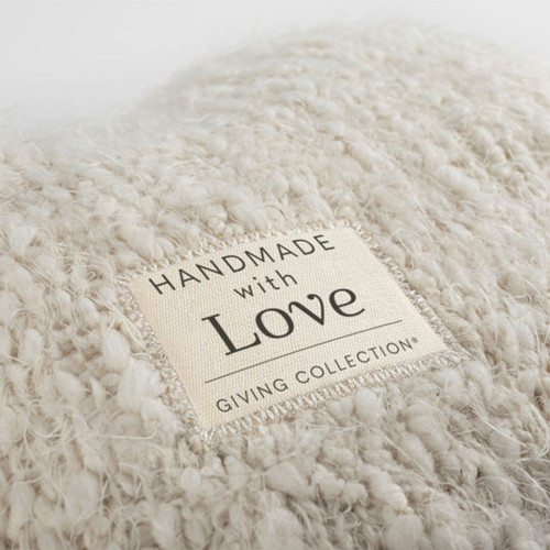 Detail photo of the heart pillow label Detail photo of the heart pillow label