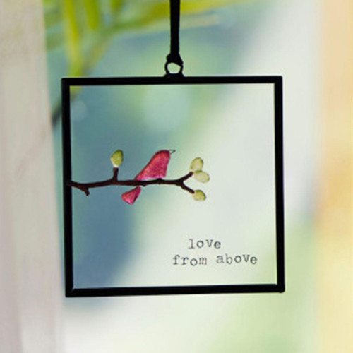 Demdaco Love From Above Suncatcher shown in front of a window