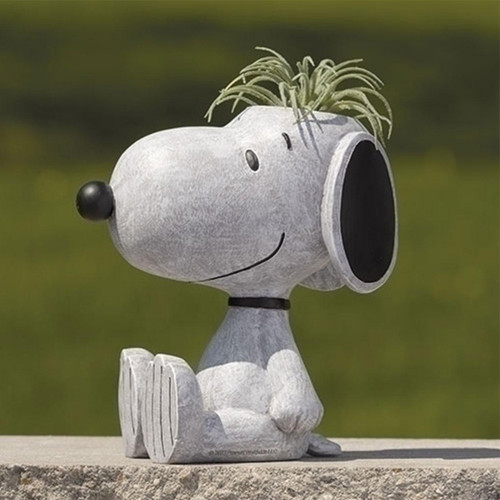 Snoopy planter shown with a plant, but a plant is NOT included with your purchase.