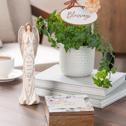 Bereavement Angel Figurine shown in a room setting