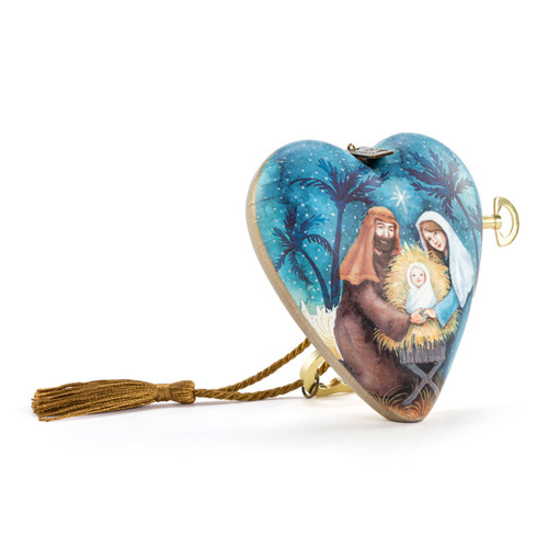 Musical Holy Family Heart Art Ornament shown with the key in the back as an easel stand