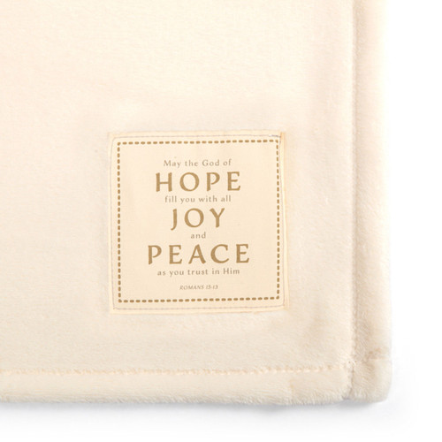 Detail of the label on the Guardian Angel God of Hope Throw Blanket