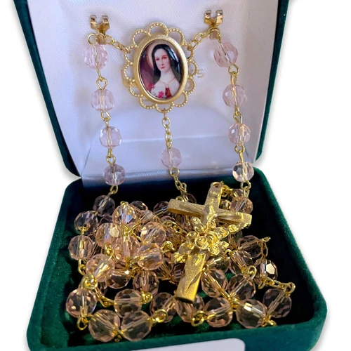 Gold Rose St. Therese Rosary shown in the gift box