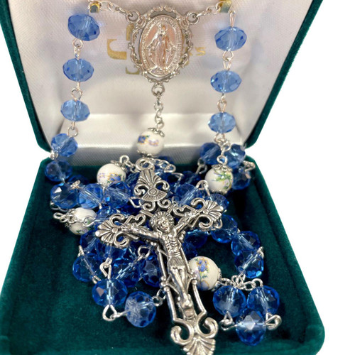 Blue Sun-Cut Crystal & Ceramic Rosary shown in the gift box
