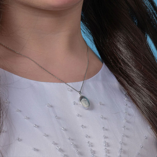 Sterling Cross Locket Pendant shown on model