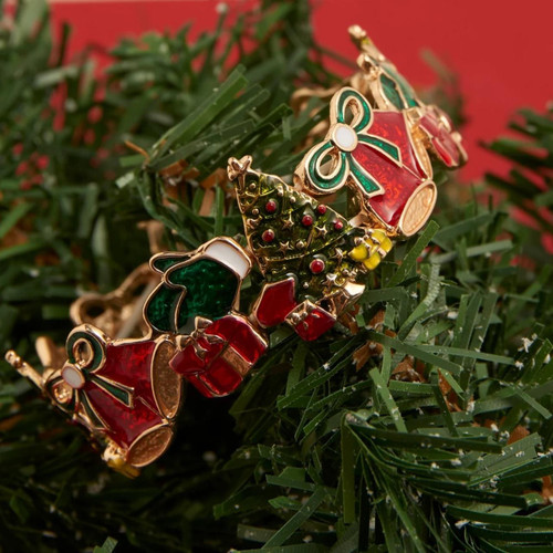 Christmas Stretch Bracelet shown with greenery