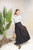 BLACK DENIM PLEATED SKIRT