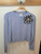 LIGHT BLUE CARDIGAN WITH FLOWER