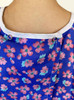 Closeup of Two Snaps on Purple Floral Ladies Hospital Gown