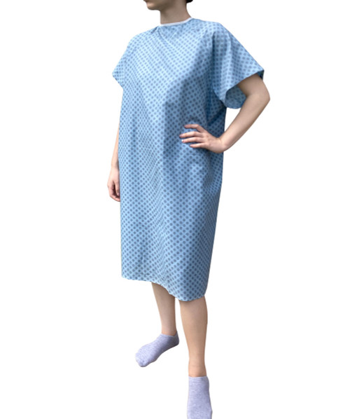 100713 Blue Economy Patient Gowns Front View on Female Model 5 Foot 5 100713 Blue Economy Patient Gowns Front View on Female Model 5 Foot 5