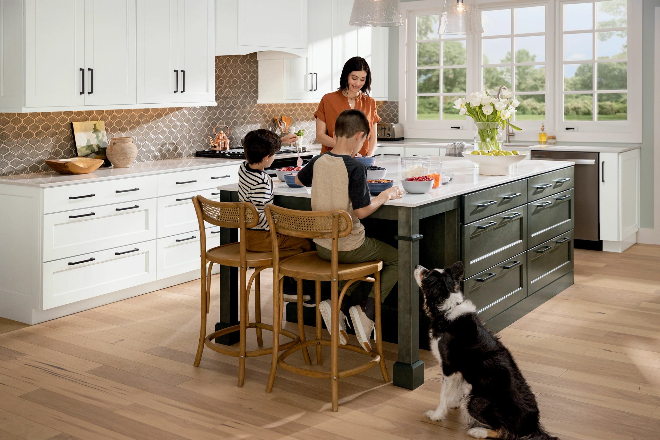Family enjoying a meal in a sustainable kitchen.