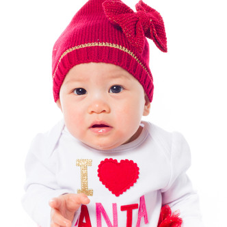 Mud Pie Red Knit Sparkle Bow Hat, featuring the darling Riley as our model