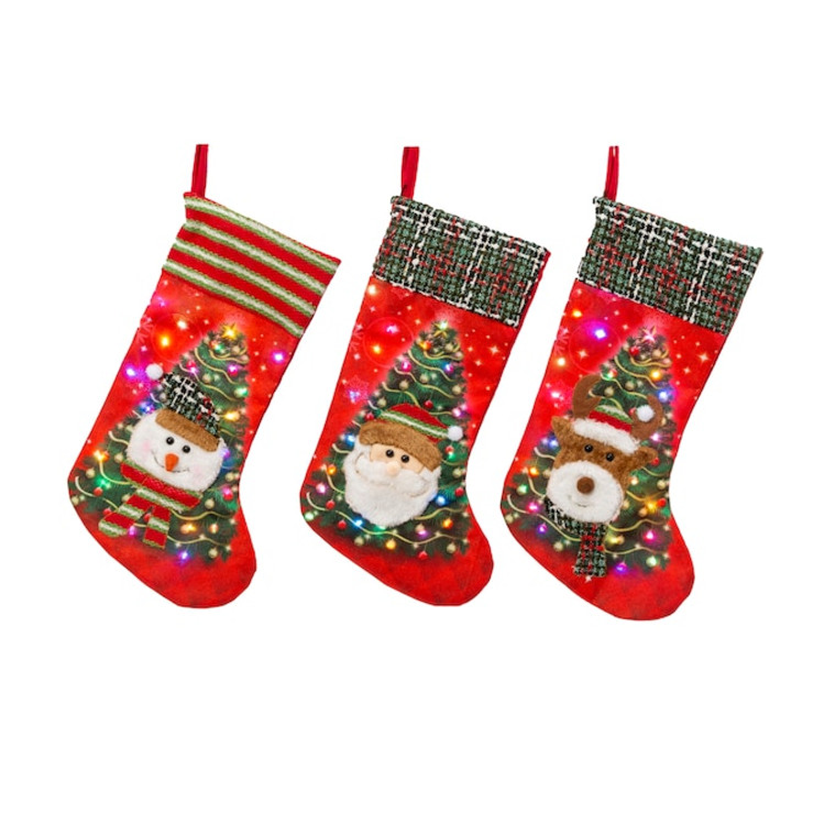 Look at the festive color of the lights on these cute stockings