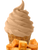 Shivery Shake Butterscotch soft serve in a cone with caramels
