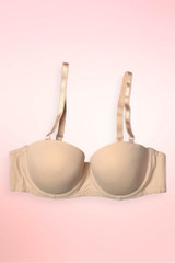 Beige seamless strapless push-up bra.