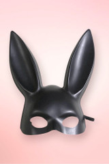 Isolated front view of a matte black bunny masquerade mask.