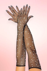 Black sparkle rhinestone fishnet gloves, elbow-length opera gloves with crystal rhinestone detail, both arms posed against pink background.
