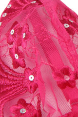 close up picture details of the embroidered floral sequins cups of the babydoll lingerie in pink