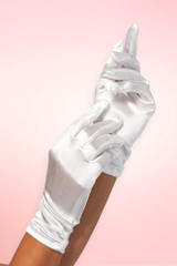 Short white satin wrist-length gloves worn on one hand, fingers pointing upward, against a pink background. Smooth glossy satin finish, elegant bridal and formal style.
