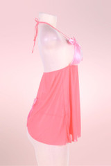 Coraline Coral Pink CUpless open Cup Empire Waist Halter Babydoll with pink satin bow accent and a matching crotchless g string thong panty actual product picture on a mannequin side view 