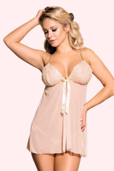 Lucia Beige open front babydoll worn by a model with on hand on the waist and one hand on her head